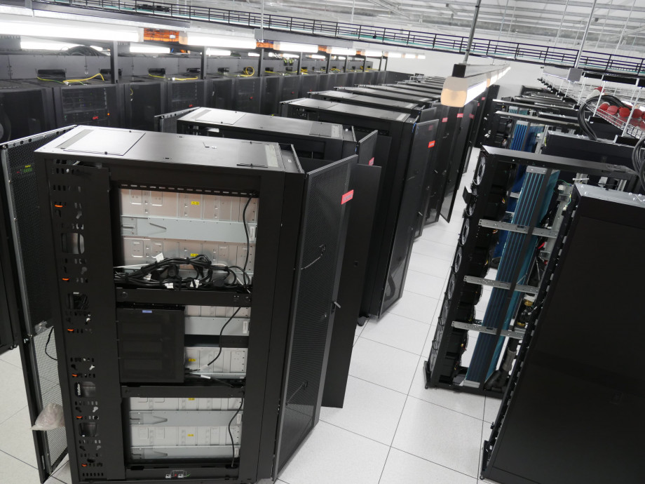 Long rows of black and silver racks standing next to each other.