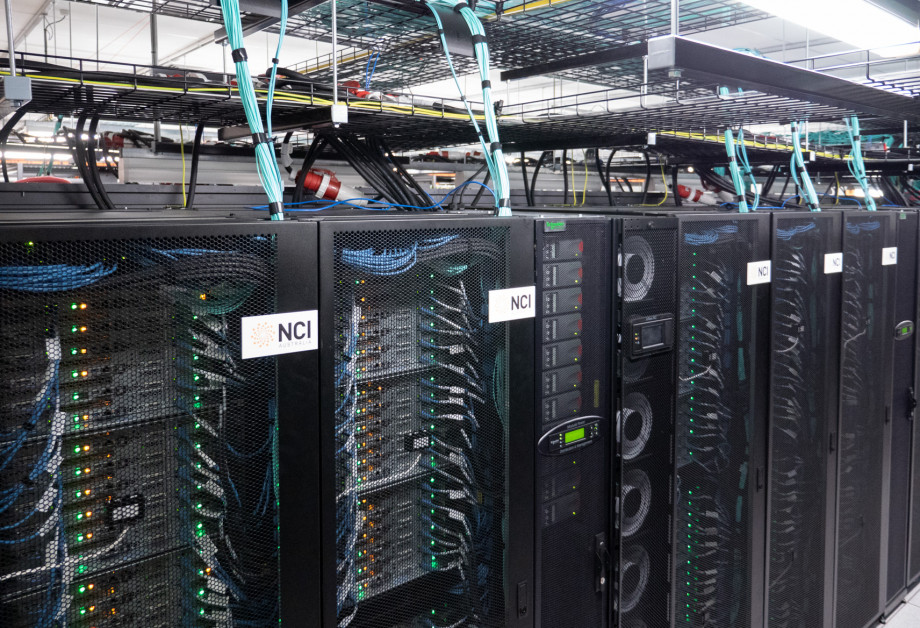An overhead view of some of the Gadi supercomputer racks.