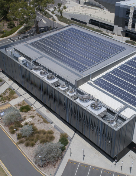 Overhead view of the NCI building showing the entire roof covered in solar panels.