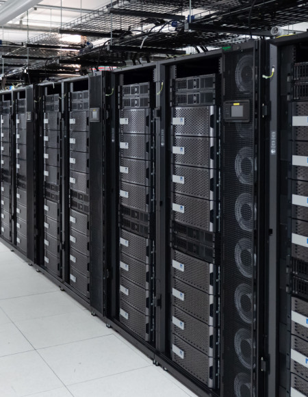 A long row of storage arrays with grey front faces stacked together.