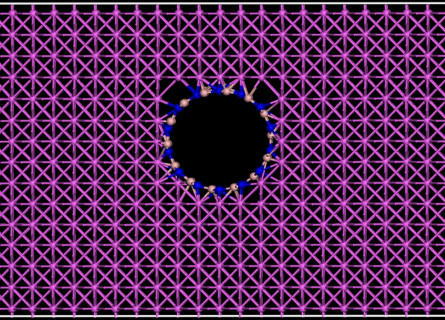 A grid of Aluminium atoms in pink surrounding a boron nitride nanotube viewed from its end.