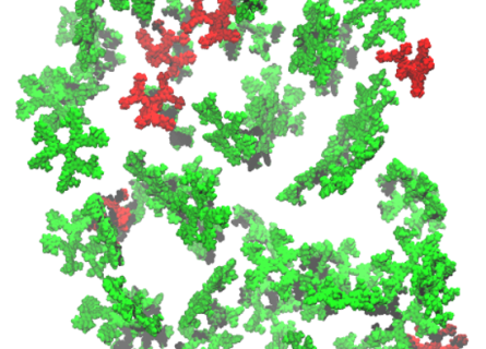 Green, red and grey model chemical molecules are vertically suspended.